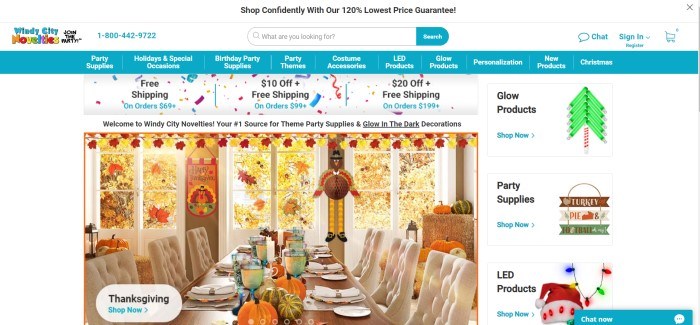 This screenshot of the home page for Windy City Novelties shows a table set for Thanksgiving Dinner, along with paper decorations, window clings, and other items sold by this company. 