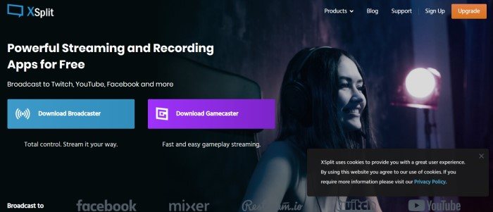 This screenshot of the home page for Xsplit has a black background with a dark filtered photo f a smiling woman who appears to be streaming a game she's playing, along with white text announcing powerful streaming and recording apps and call-to-action buttons in blue and purple.