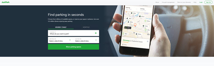 Just Park Website Screenshot showing someone in their car with the Just Park app