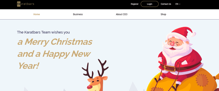 A screenshot from the Karatbars website showing a cartoon Santa with a reindeer