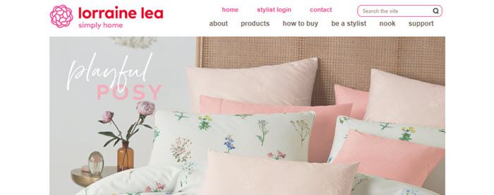 Lorraine Lea Website Screenshot showing a bed with pretty linen