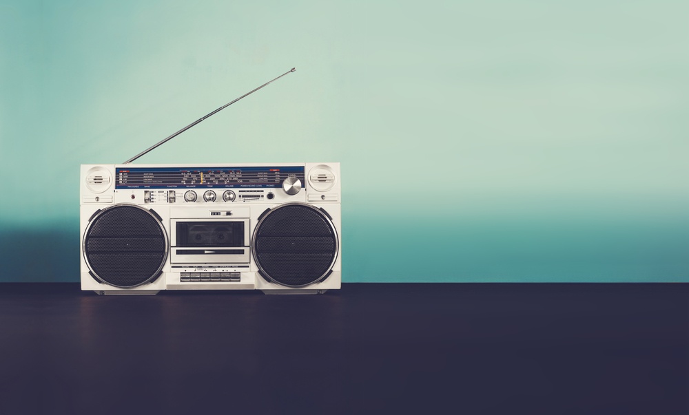 retro boombox radio on blue background