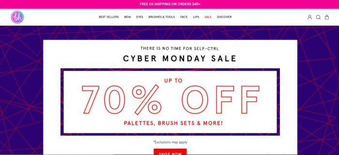 This screenshot of the home page for BH Cosmetics has a pink header announcing free shipping, a white navigation bar, a dark blue background with crossing red lines, and a white main section with black and red text announcing a 70% off sale for Cyber Monday.