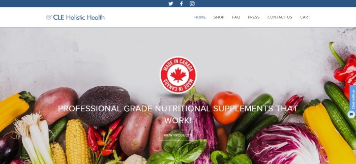 This screenshot of the home page for CLE Holistic Health has a white and blue navigation bar above a large overhead photo of several fruits and vegetables lying on a white background, along with a "Made in Canada" seal in red and white and white lettering announcing professional-grade nutritional supplements.