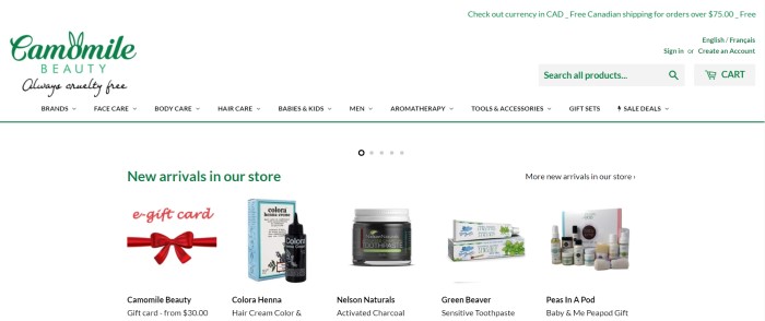 This screenshot of the home page for Camomile Beauty has a white background with a green logo and green elements, as well as a row of small photos of new product arrivals. 