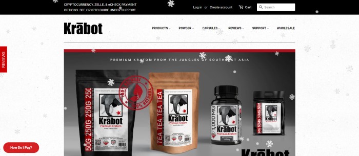 This screenshot of the home page of Krabot has a white background with gray snowflakes, a black header announcing the ability to pay with cryptocurrency, and a photo with a gray background showing sample packages of Kratom products in black, white, and brown.