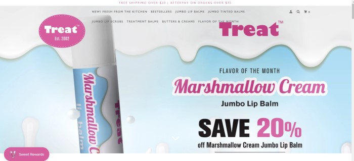 This screenshot of the home page for Treat Beauty has a blue and white background that looks like melting marshmallow behind a photo of a Marshmallow Cream jumbo lip balm and purple text announcing Marshmallow Cream as the flavor of the month. 