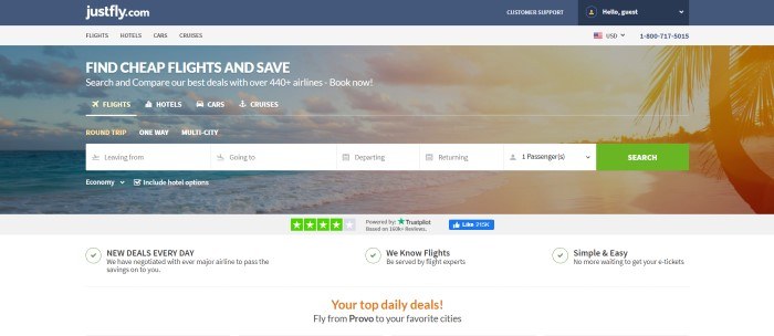 This screenshot of the home page for JustFly had a dark blue header, a light gray navigation bar, and a gray and transparent travel search window in front of a photo of a seascape.