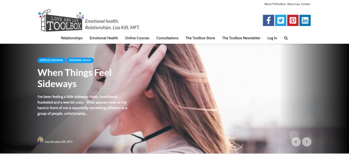 This screenshot of the home page for Love And Life Toolbox has a white header and navigation bar above a photo of a side view of a woman running her fingers through her hair, along with white text that reads "When things feel sideways" and two blue call-to-action buttons.