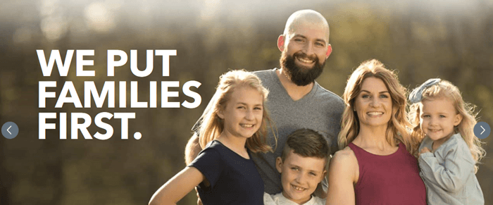 An image of a happy family with the phrase 'we put families first'