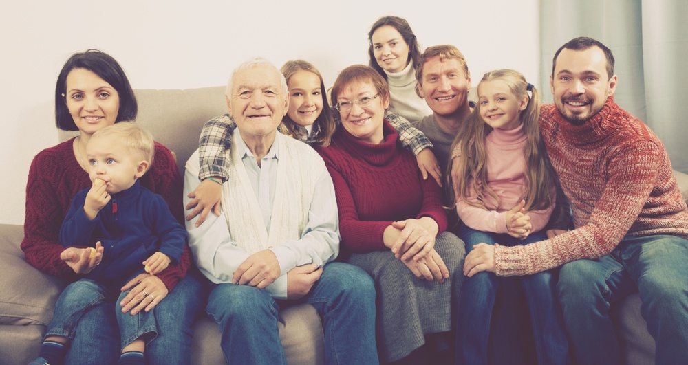 multi-generational family in sepia filter photograph