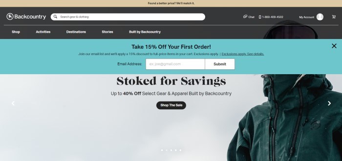 This screenshot of the home page for Backcountry has a tan header, a black search and navigation bar, an aqua 15% off discount opt-in bar, and a collar-to-waist photo of someone in a dark green rain jacket on the right side of the page, along with black text announcing a 40% off sale and a black call-to-action button.