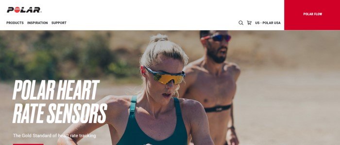 This screenshot of the home page for Polar has a white header and navigation bar above a large photo of a beaded, bare chested man and a blonde woman with a ponytail and green sports bra, who are both running, both wearing sunglasses, and both wearing heart rate sensors.