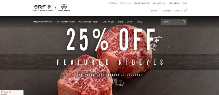 This screenshot of the home page for Snake River Farms shows two cuts of raw beef on a dark cutting board behind white text announcing a 25% discount on Ribeye steaks. 