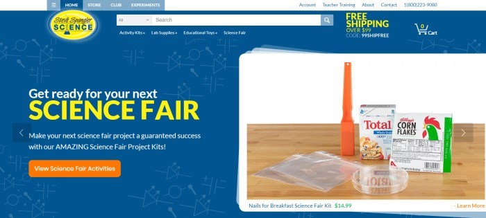 This screenshot of the home page for Steve Spangler Science has a blue background, white and yellow text, and a photo of a science fair kit containing a couple of boxes of cereal, along with an orange call-to-action button inviting customers to view science fair activities.