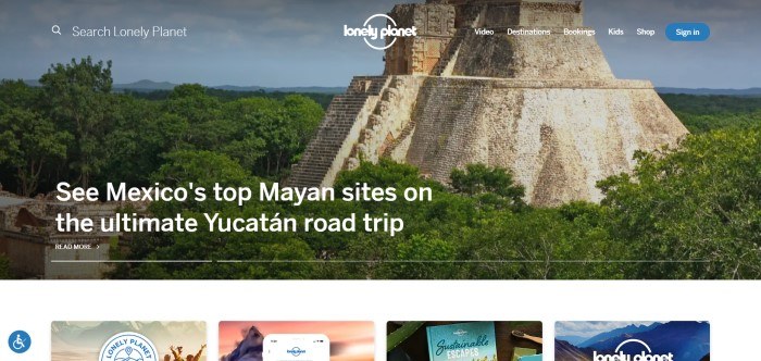 This screenshot of the home page for Lonely Planet has a photo of an ancient ziggurat ruin in a jungle setting behind white text inviting visitors to tour Mexico's Mayan sites.