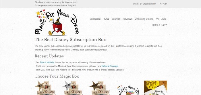 This screenshot of the home page for Magic At Your Door has a gray background and black text describing Disney subscription boxes, along with a large logo of a red box with yellow shoes, white gloves, and a black hat with yellow stars and a moon on it, which is near the top of the page, and a row of images showing different levels of subscription boxes along the bottom of the page.