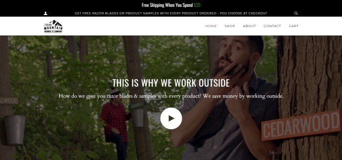 This screenshot of the home page for Rocky Mountain Barber Company has a dark header with white text announcing free shipping and free samples, a white navigation bar, and a still shot from a video with two bearded men in the woods, along with white text introducing the video and explaining that this company sends free gifts with every order.