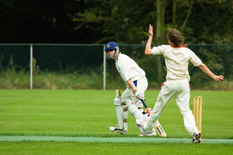 two cricket players on field