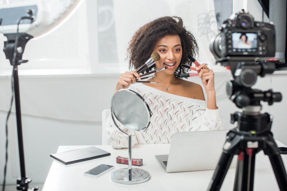 african american beauty blogger recording video