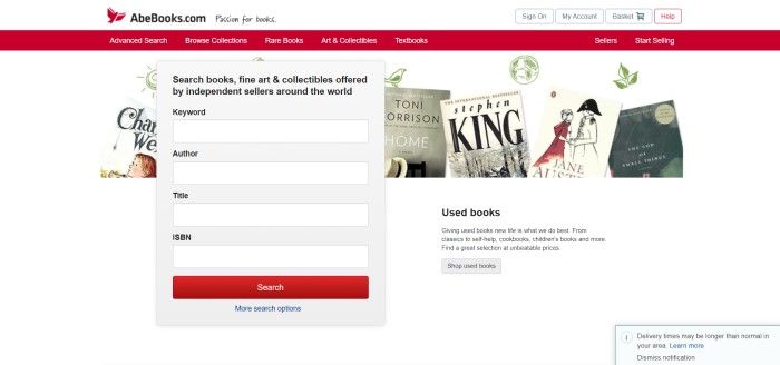 This screenshot of the home page for Abe Books has a white header, a red navigation bar, and a white section with a row of book covers behind a white search window with black text and a red call to action button.