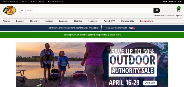 This screenshot of the home page for Bass Pro Shops has a black navigation bar, a gray search bar and secondary navigation bar, a blue and green set of announcement bars, and a photo of a smiling man, woman, and girl in lifejackets playing near a lake and a tent at sunset.