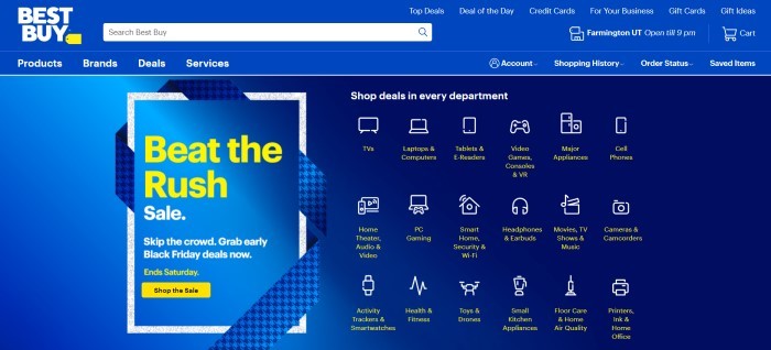 This screenshot of the home page for Best Buy has a royal blue background with text in white and yellow, along with several white-outlined icons for Best Buy departments such as laptops, TVs, video game controllers, and more, and an advertisement in yellow text to beat the Black Friday rush.