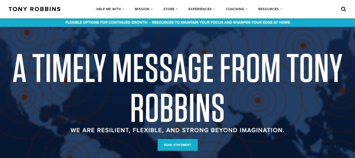 This screenshot of the home page for Tony Robbins has a white navigation bar above a blue announcement section and a darker blue main section with a map of the world in the background and white text in the foreground announcing a special message from Tony Robbins, as well as lighter blue call-to-action button.