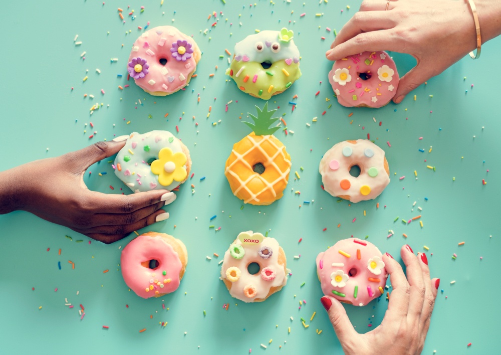 vintage frosted donuts on pastele blue background