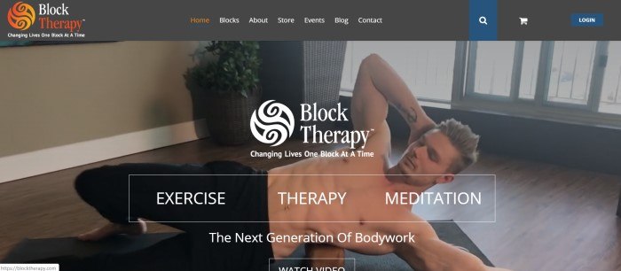 This screenshot of the home page for Block Therapy has a black header with an orange and white logo above a dark-filtered video shot of a shirtless man lying on a therapy block near a window, along with white text announcing Block Therapy options.