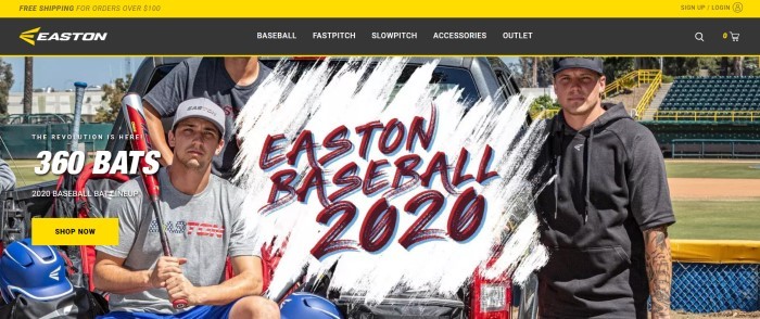 This screenshot of the home page for Easton Baseball/Softball has a yellow and black header with white lettering in the navigation bar above a large photo showing a team of adult softball players with hats, bats, tee shirts, and other branded Easton gear, along with a white and red announcement section and a yellow call to action button.