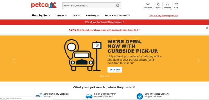 This screenshot of the home page for Petco has a white background and navigation bar, a red sales bar, a yellow main section with black text announcing curbside pickup, and black text with blue icons on the lower edge of the page