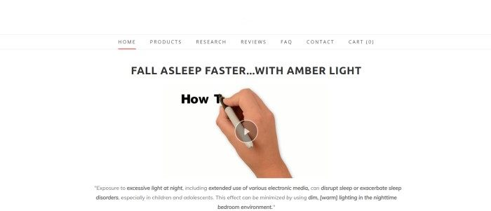 This screenshot of the home page for Somnilight has a white background and a simple screenshot of a video with black text reading "Fall asleep faster with amber light" and a human hand with a black marker apparently writing on a white surface.