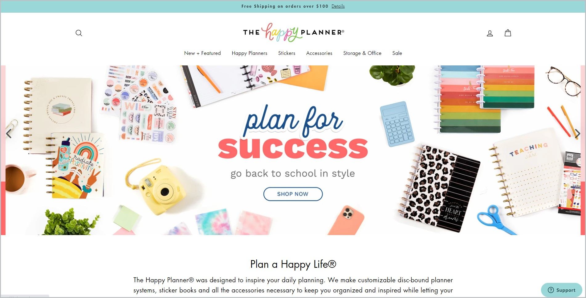 screenshot of The Happy Planner homepage, with light green announcement bar, white header with the website's name and main navigation menu, it showcases images of planners and planner accessories