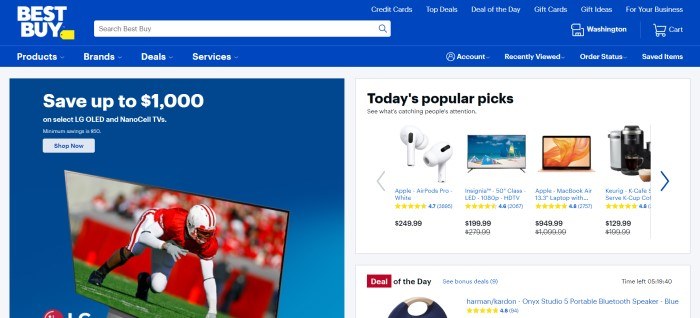 This screenshot of the home page for BestBuy has a royal blue and white header and navigation bar above a divided main section, with a sales announcement for TVs in a blue box on the left side of the page and a row of popular items in a white box on the right side of the page.