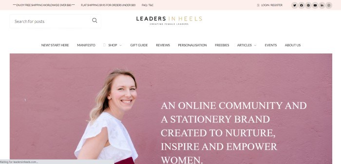 This screenshot of the home page for Leaders In Heels has a pale pink header, a white search and navigation bar, and a photo of a smiling blonde woman in a white shirt standing in front of a pink background, along with white text announcing the stationery products.