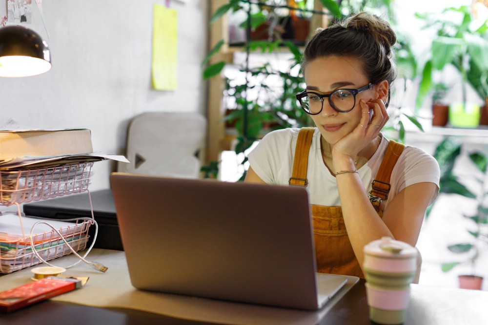 young woman doing data entry job at home