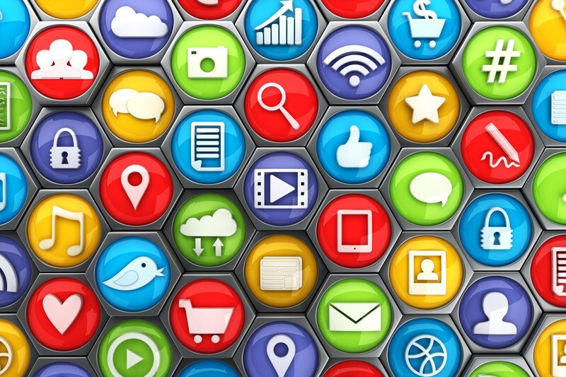 This image shows several circles in red, purple, orange, green, blue, and yellow lying beside each other with white icons on them depicting several different social media platforms, representing the best social media affiliate programs.