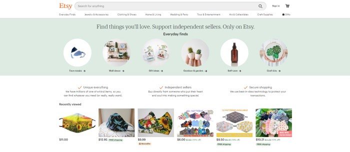 This screenshot of the home page for Etsy has a white search bar and navigation bar, a pale green main section with circular photos and text describing several different categories, a row of three columns of text in black sharing Etsy features, and another small row of photos showing various face masks for sale in Etsy stores.