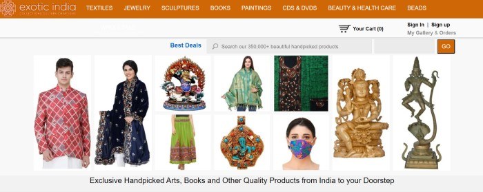 This screenshot of the home page for Exotic India Art as an orange navigation bar above a white main section that includes several photos of handpicked art pieces, such as statues and clothing.