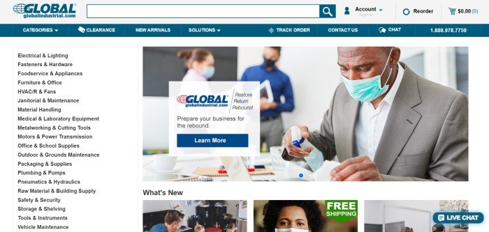 This screenshot of the home page for Global Industrial has a gray search bar, a blue navigation bar, and a white main section with a row of categories in black text on the left side of the page and a photo of a man in a face mask spraying disinfectant toward his keyboard, as well as a white text section with black text and a blue call to action button.