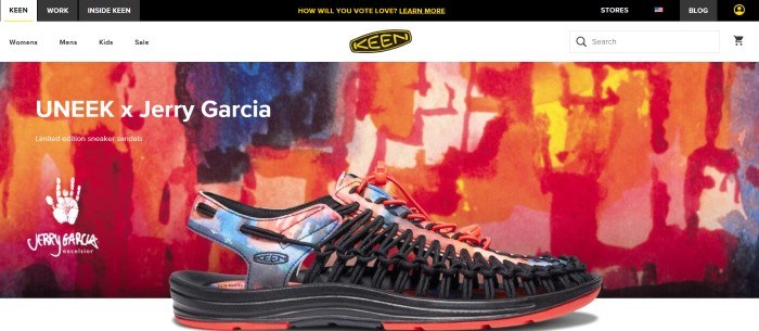 This screenshot of the home page for Keen has a black header, a white navigation bar, and a photo of a multicolored sandal in black, orange and blue in front of a painting in the same colors, along with white text on the left side of the page.