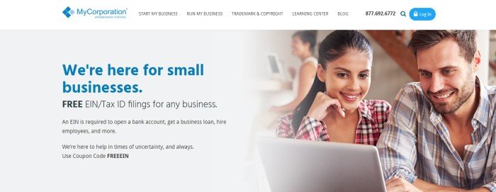 This screenshot of the home page for MyCorporation has a white header with black and blue text above a filtered photo with a white section and blue and black text on the left side of the page and a smiling man and woman, both in plaid shirts, looking at a laptop screen on the right side of the page.