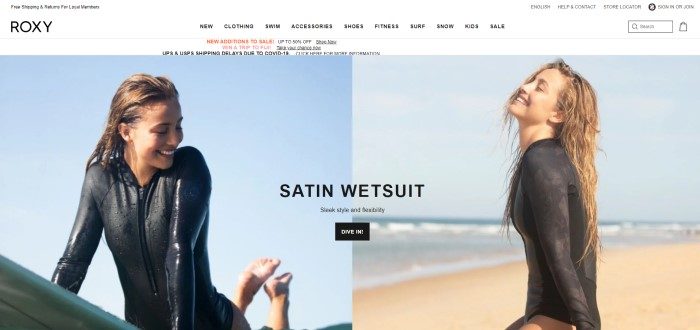 This screenshot of the home page for Roxy has a white navigation bar above two side by side photos showing a smiling woman in a black wetsuit playing in the water on the left side of the page and sitting on the beach on the right side of the page, along with black text and a black call to action button.