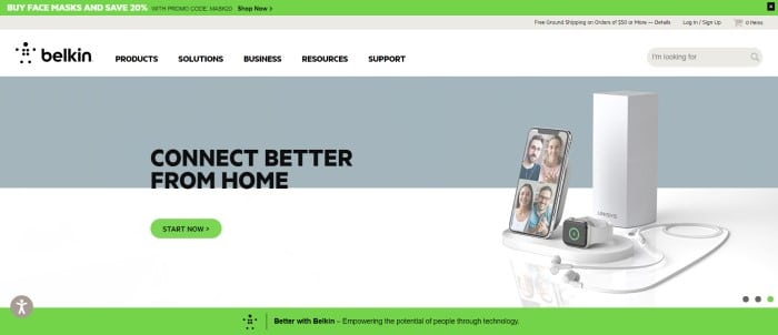 This screenshot of the home page for Belkin has a green header above a white navigation bar with black text, which is above a gray and white section with a display of home connection products on the right side of the page and black text with a green call to action button on the left side of the page.