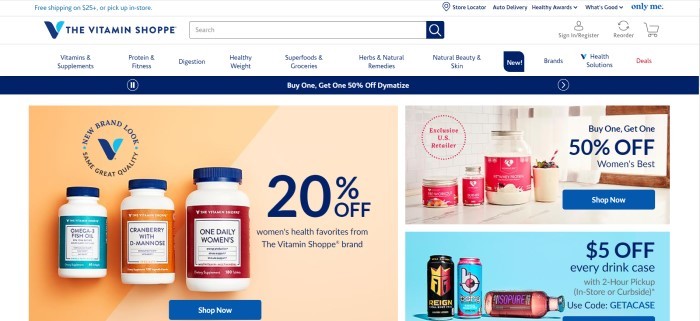 This screenshot of the home page of The Vitamin Shoppe has a white header and navigation bar with blue text, a blue announcement bar, an orange section with a photo of supplements on the left side of the page, a small photo of workout supplements with red labels on the right side of the page, and another photo with a blue background and sports drinks on the lower right side of the page.