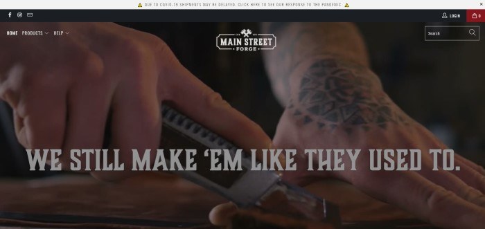 This screenshot of the home page for Main Street Forge has a gray header above a large photo showing a man's hands holding a specialty tool as he slices through a sheet of leather, along with white text.