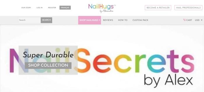 This screenshot of the home page for Nail Hugs has a white background, a multicolored logo at the top and center of the page, navigation areas in gray and pink, and a white main section with multicolored text and a gray call to action button.