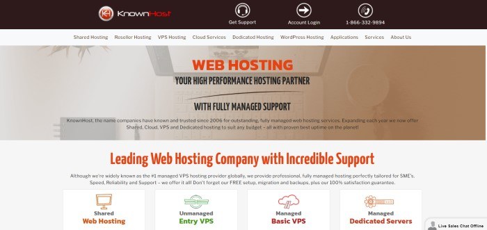 This screenshot of the home page for KnownHost has a black header, a white navigation bar, and a tan filtered overhead photo of an open laptop behind red and black text.