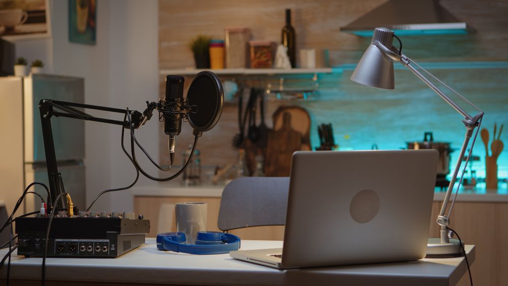 podcasting equipment with mac laptop in office